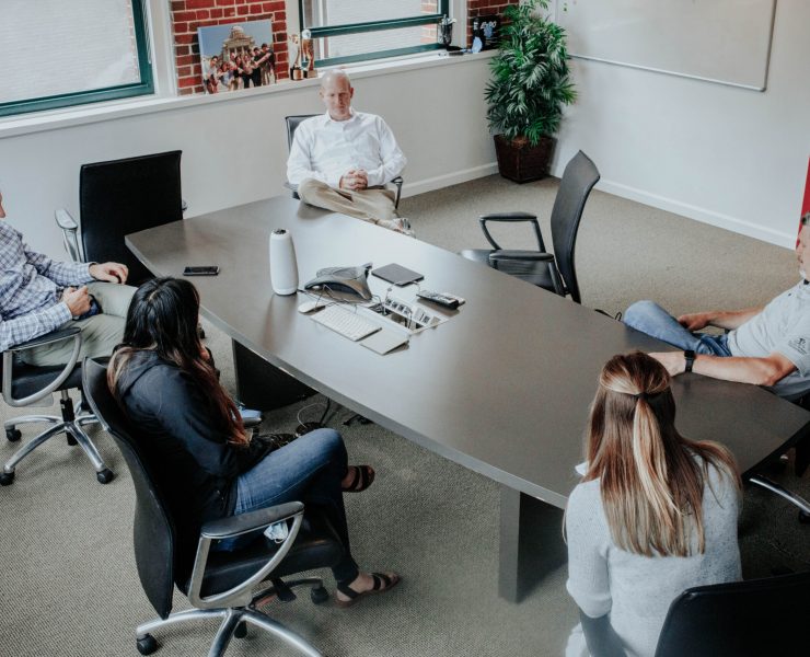 Meeting at conference table at Portland Webworks